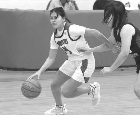 DRIVING- Roughhette Natalie Urias drove to the basket against a Floydada defender. The Roughettes defeated Floydada, 49-36. Sundown will face Denver City on the road, Tuesday, November 15th. (Photo Courtesy of Chris Bratcher)