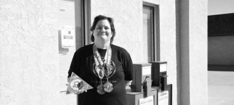 SPARTAN TRIFECTA - Katie Ervin earned her SPARTAN trifecta this past weekend. Here she is pictured with her medals and trifecta award. Earning the trifecta is a huge accomplishment and she is truly honored to have been able to earn it. (Staff photo by Hannah Woodrum)