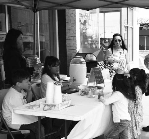 LEMONADE DAY! - CoCo Bee’s lemonade stand at the First Saturday Shop the Square and Lemonade Day on the downtown Levelland square June 3. My Main Squeeze lemonade stand won Best Tasting Lemonade and L&amp;L’s lemonade stand won Best Decorated. (Staff Photo Victoria Byrnes)