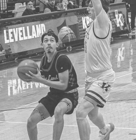 PUMP FAKE - Levelland Lobo Ozzie Solano pump faked the defense during the team’s last game against the Krum Bobcats this past Friday in Abilene. (Staff photo by Aalijah Soliz)
