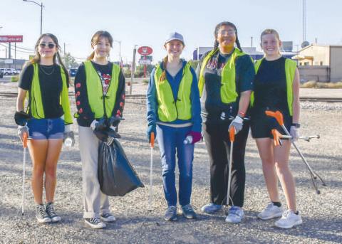 Billie Gonzalez, Gali Hernandez, Ada Niederhauser, Chris Mitchell and Raily Pence spent their Saturday morning volunteering to cleanup up areas along Highway 114 during Keep Levelland Beautiful’s Community Wide Clean-Up Event. (Staff photo by Essence Childres)