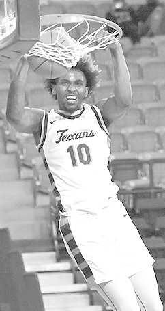 TWO HAND- SPC Texans Jalen McDonald put in a two handed dunk for two of his 10 points in the Texans win over Howard. With the win, SPC improves to 19-5 on the year and 7-3 in league play and will be back on the floor on Monday when they travel to Borger to take on Frank Phillips at 7:30 p.m. (Photo Courtesy of Jordan Irvine)