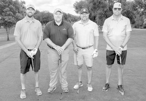 FLIGHT TWO THIRD PLACE- The team representing Wilbur-Ellis finished in third place at the SPC Scholarship Scramble. Shown from L-R are: Nathan Foster, Andy Neeb, Dusty Parker and Justin Garrett. (Photo by R&amp;P Photographers)