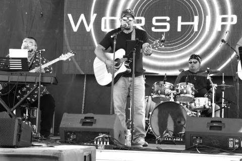 JAMAICA CONCERT - One of the many bands that participated in the St. Michael’s Catholic Church Jamaica Annual Event on Sunday was Worship 4. Many community members attended the concert while also enjoying the many vendors and activities. (Photo courtesy of Emily Campos)