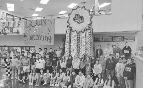 GIANT MUM-- LHS students in Ms. Tori Henderson's Floral Design &amp; Horticulture classes thought outside the box and made a gigantic mum for Homecoming this year. This was a fun way for students to show school spirit and celebrate Homecoming. Pictred are Ms. Tori Henderson’s Floral Arrangement Class &amp; Horticulture Class. (Photo courtesy of Levelland ISD)