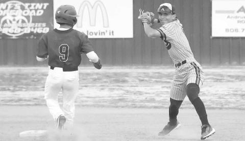 DOUBLE PLAY- The Levelland Lobo varsity baseball team moved to 13-7 on the season with a 24-3 home win over the Tulia Hornets. Lobo second baseman Noah Tienda completed a double play with a throw to first. (Staff Photo by Dom Puente)