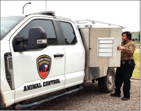 FIRST RESPONDERS-- Levelland Animal Control Officer Taylor Perez helps enforce laws regarding stray, dangerous, nuisance and unwanted domestic animals as well as investigating complaints, patrolling assigned areas, capturing animals and performing other duties related to humane animal protect and control. (Staff photo by Lynda Work)