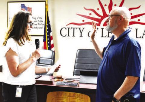 CITY COUNCIL BOBBY MORRIS-- Levelland City Council Bobby Morris, representing District A, was sworn in by City Secretary Andrea Corley on Monday. (Staff photo)