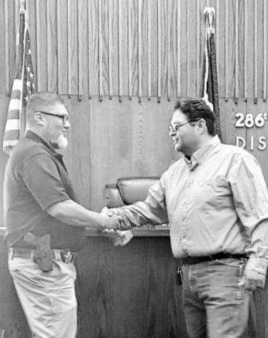 COCHRAN COUNTY’S NEWEST DEPUTY - Pictured is Kevin Lucio (right) being officially sworn-in as a deputy by Cochran County Sheriff Jody Guerra (left). A Cochran County native, Lucio has served as a jailer for the Cochran County Sheriff's Office for the past five years. Deputy Lucio recently completed the SPAG Regional Law Enforcement Academy. Lucio is the newest deputy to join the Cochran County Sheriff’s Office. (Photo courtesy of Jody Guerra)
