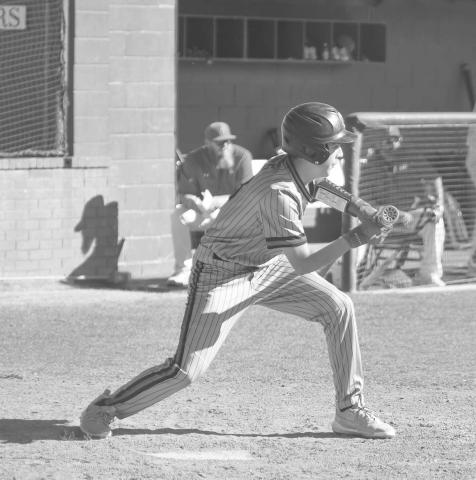 BUNT - Levelland Lobo Anson McMahon got ready to bunt the ball for the Lobos during their contest last Tuesday night in their Linedrive Classic Tournament. (Staff photo by Dom Puente)