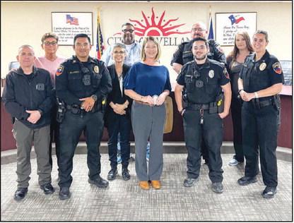 NEW ADDITION - The Levelland Police Department (LPD) welcomed Detective Brown to their ranks last week. City of Levelland Municipal Court Judge, Esmeralda Rowand conducted the Oath of Office Ceremony for Brown. Pictured is Brown (middle) alongside members of the LPD. (Photo courtesy of the LPD)