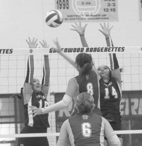 NO EASY SHOTS - Levelland Loboettes Mia Morin and Trinity Wafers jumped high to make sure to give the Greenwood Rangerette a tough shot last Tuesday on the road. (Staff photo by Aalijah Soliz)