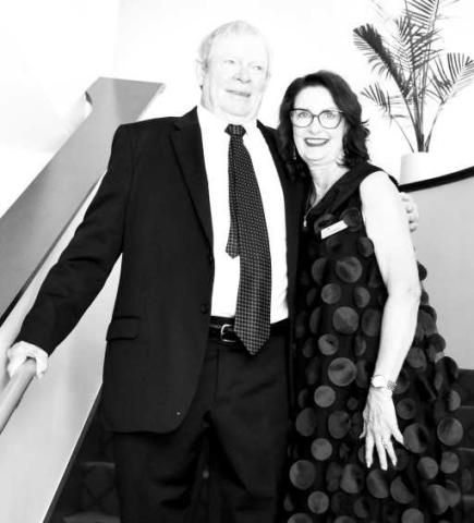 READY FOR GRAND OPENING-- Wallace Theater board member Joe Tubb and Iris Keeling on the elegant stairway at the Wallace Theater. (Staff photo by Lynda Work)