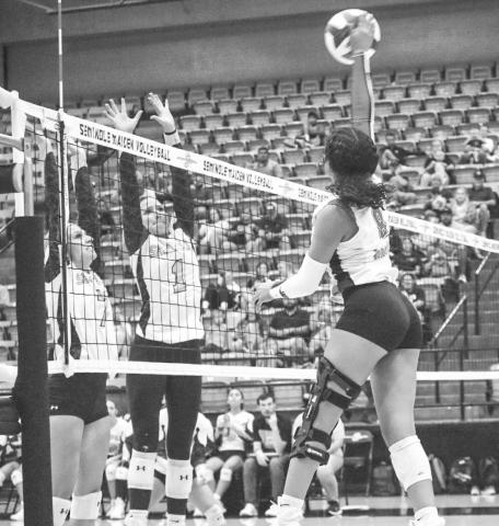 VERTICAL - Levelland Loboette Mia Sepulbeda rose above the net to spike the ball against the Seminole Maidens this past Tuesday on the road. (Staff photo by Aalijah Soliz)