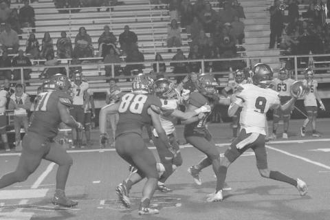 CLOSING SPACE- Sundown defenders (71) Dakota Golightly, (88) Jadon McAdams and (11)Michael Salazar close on the Bulldog QB. The Roughnecks defeated Tahoka at home last Thursday and punched their tickets to the playoffs. The Roughnecks drew undefeated Stratford (10-0) for the first round of the playoffs to be played in Hereford on Thursday, November 10th.