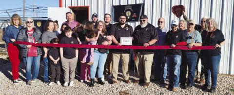 ALIEN ARMS-- Alien Arms held its ribbon cutting this past Saturday joined by the Levelland Chamber of Commerce, friends and family. The veteran owned and run business is owned by Ivan and Ramon Melendez and was established in 2016. The new location, which opened at 1501 Houston in January 2026, sells guns and accessories, does gunsmithing, maintenance, repairs and restoration. Visit the location or call 575-626-9794 for more information. (Staff photo)