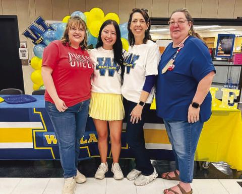 WAYLAND CHEER - LHS Senior Mackenzie Dominguez signed her letter of intent to cheer for Wayland Baptist University. The signing ceremony was held Thursday in the high school commons. Pictured with Dominguez are Coaches DeMerritt, Northcutt and Villanueva. (Photo courtesy of Cristal Isaacks)