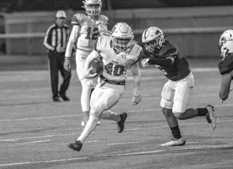 CANT CATCH ME - Ropes athlete Jacob Wyatt ran the ball during the Eagles playoff game against the Ralls Jackrabbits last Friday. (Photo courtesy of Donovan Martin)