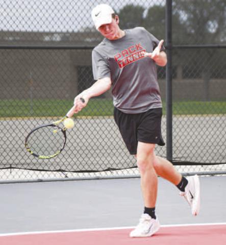 ON THE RUN – Pictured is Reese Payton swinging his tennis racket on the run as he drills keeping the ball in play during Levelland tennis practice. (Staff photo by Jentezen Smith)