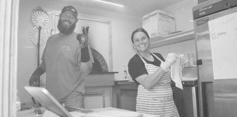 PIZZA - Rollin Woodfired Pizza were out this past Saturday at the last Saturday Shop on the Square for the year. They were selling freshly made pizzas. Pictured above are Sam Hoel and Hunter Scott. (Staff photo by Aalijah Soliz)