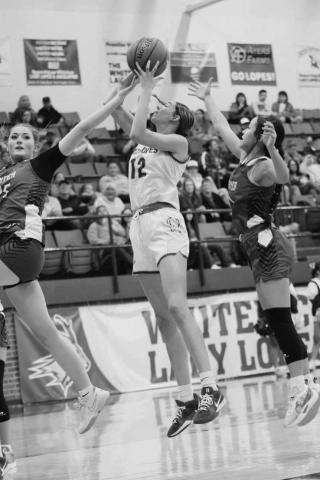 LAY-IN - Whiteface Lady Lope Abi Soliz shot the ball quickly for the two points during the team’s game against the Smyer Lady Cats at home. (Staff photo by Aalijah Soliz)