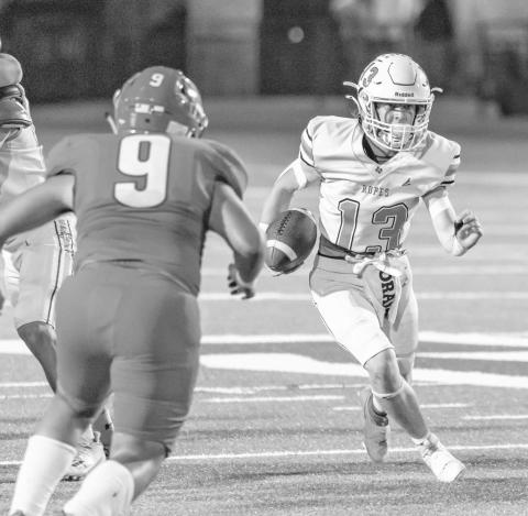 OPEN FIELD - Ropes Eagle Zayden Pittman got into the open field where Sundown Roughneck Brayson Frey was waiting to make the open field tackle in Sundown this past Friday. (Photo courtesy of Donovan Martin)