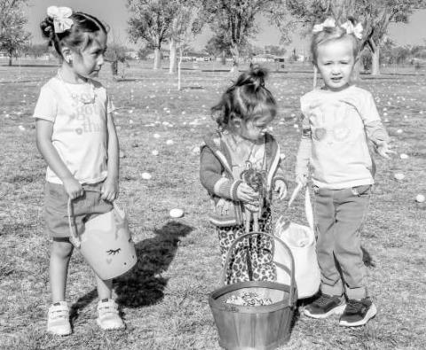 EGGS MARK THE SPOT - Any bunny else excited for Easter? These bunnies were at the Easter Egg hunt at the City Park near Pavillion One on Saturday. Pictured from left to right are: Yareli Sanchez, Hallie Pinkert and Dylan Huber. (Staff photo by Hannah Woodrum)