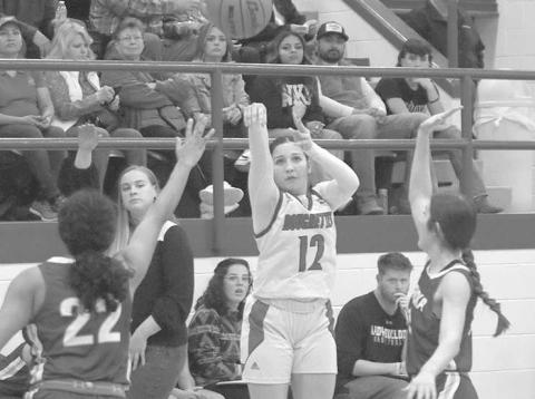 THREE- The Sundown Roughettes hosted Tahoka Friday night and ended the season with a lopsided 6333 victory to finish second in the district. Kaydence Loftin knocked three of her eight points from behind the arc. (Photo Courtesy of Chris Bratcher)