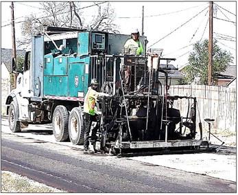 The City of Levelland street micro surfacing project is underway on Sherman, Alamo, Austin, Ave. A, Ave. C streets with some road closures and limited traffic. Residents were urged to avoid parking on streets where sections were being worked on. (Staff Photo)