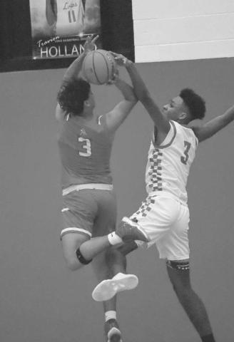 DEFENSE - Levelland Lobo Eryk Jones blocked the shot from the Sweetwater Mustangs during the team’s win last Tuesday night at home. (Staff photo by Aalijah Soliz)