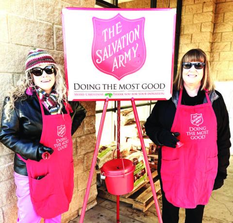 RING THE BELL- Levelland ISD Special Education Director Lacey Doster and DAEP Administration Laurie Jones are ringing the bell for the Salvation Army. Throughout the month of December, LISD administrators and educators will be ringing the bell to help raise funds for the Salvation Army to make a meaningful difference for individuals and families across Texas. (LISD photo)