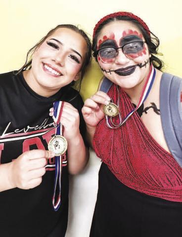 LHS ENSEMBLE SOLOS-- LHS Allegro Winterguard Mia Chavarria and Rosa Servin each received Division 1 ratings for their solos at the Howard County Indoor Festival. (Levelland ISD photo)