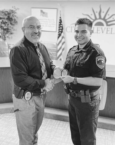 NEW ADDITION - The Levelland Police Department welcomed Officer Ernest Hernandez to their ranks Tuesday afternoon. Pictured is LPD Chief Albert Garcia and Officer Hernandez following his swearing into the department at Levelland City Hall. (Photo courtesy of Mateo Lopez)