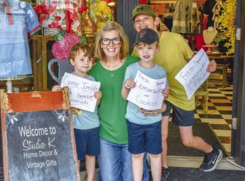 - Pictured from left to right are Brayden Trotter, Kenna Trotter, Brody Trotter, and Bryce Trotter are all smiles at Main Streets Lemonade Day in downtown Levelland on Saturday. (Staff photo by Hannah Woodrum)