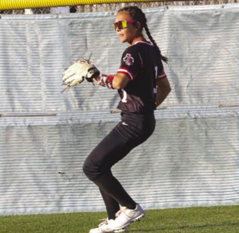 OUT - Levelland Loboette Saydi Mendez threw the ball back to her team after catching a pop fly into center field during the team’s game against the Plainview Lady Bulldogs. (Staff photo by Aalijah Soliz)