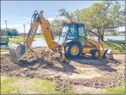 SLED HILL - The City of Levelland Parks Department recently reworked the sled hill path near Lobo Lake. Wanting to adjust the top of the path and straighten out the lower section, dirt work was completed last week. Parks Director Dusting Reichelt stated the adjusted path will allow for more fun and will be safer. Reseeding was also done will the hill was being worked on. (Photo courtesy of the City of Levelland)