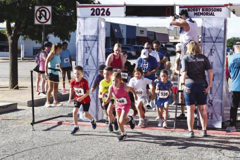 RUN THE MOSAIC - 1 Mile Kids' Run participants take off at 9 a.m. sharp during the Bobby Birdsong Memorial Mosaic Run. (Staff photo)
