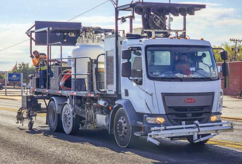 FINISHING TOUCHES - A Texas Department of Transportation crew wrapped up painting lines down Houston Street and Avenue H. Recently, TxDOT crews spent a handful of days seal coating both roadways and replacing reflective markers. (Staff photo by Dom Puente)