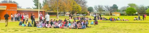 FUN IN THE SUN? OR SHADE? - Community members spent time outside captivated by the solar eclipse event that too place Monday afternoon. Students and faculty from Capital Elementary enjoyed their time outside observing the eclipse. (Photo courtesy of Emily Campos)