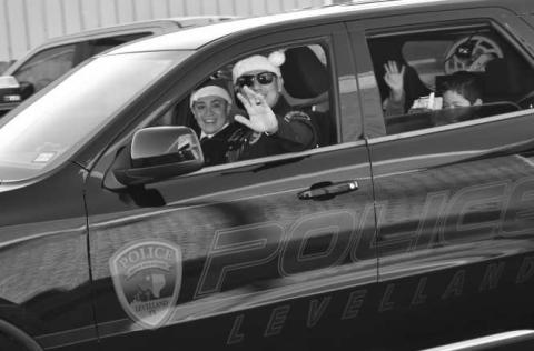 BLUE SANTAS - The Levelland Police Department and Blue and You hosted an their annual Blue Santa Event which began with escorting local children to McDonald’s last Saturday. (Staff photo by Emily Campos)