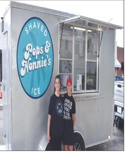 POPS &amp; NONNIE’S – Pictured are LaNita Avery and LaTryle Sehon with their shaved ice truck on Thursday. The pair came to the square for this month’s Food Truck Day. (Staff photo by Ada Niederhauser)