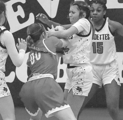 GRIT - Levelland Loboette Kaylee Penner fought for the jumpball during the teams district win against the Sweetwater Lady Mustangs this past Tuesday. (Staff photo by Aalijah Soliz)