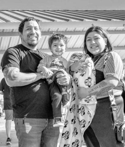 HOPPING DOWN THE BUNNY TRAIL - The Reyna family spent their past Saturday morning at the City Park near Pavillion One searching for Easter eggs during the City of Levelland Parks Department annual Easter Egg Hunt. (Staff photo by Hannah Woodrum)