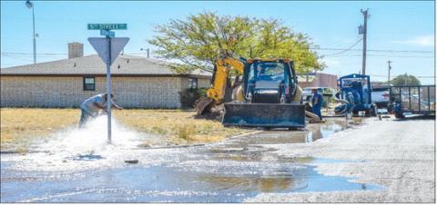WATERLINE WORK - The City of Levelland public works crew were working to address a waterline issue along 5th Street and Avenue A on Wednesday afternoon. The crew worked throughout the remainder of the day to make repairs. (Staff photo by Evin Thomas)