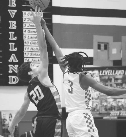 TIP OFF - Levelland Lobo Eryk Jones gave the Lobos the first possession of the game against the Jayton Jaybirds this past Tuesday. The Lobos fell to the ranked Jaybirds 56-44. (Staff photo by Aalijah Soliz)