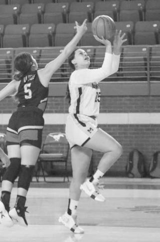 FLOATER - Morton Maiden Ruby Guttierrez shot the ball during the teams first game of the Denver City Tournament last weekend. (Staff photo by Aalijah Soliz)