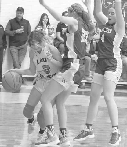 BASELINE- Madi Chavez drove under the basket for the Whitharral Panthers in a 63-15 girls’ high school home loss to the Whiteface Lady Lopes last Friday. Chavez led the Lady Panthers with nine points and a rebound. (Photo Courtesy of Jay Kelley)
