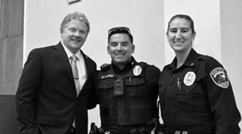 NEW BEGINNINGS - Pictured left to right Dr. Matthew Birdwell, police officer Lopez and Chief O’Byron, accepted the $10,800 grant to provide the LPD new Optics. (Photo courtesy of LPD)