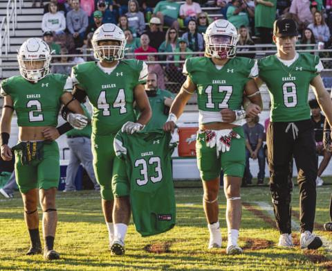 HONORING TUCKER - The Ropes Eagles honored Whitharral Panther Tucker Parkinson who recently passed October 1, by carring his jersey number to the coin toss against the Smyer Bobcats Friday. Teams around the area are honoring Parkinson by carrying his football number during the teams coin toss. (Photo courtesy of Donovan Martin)