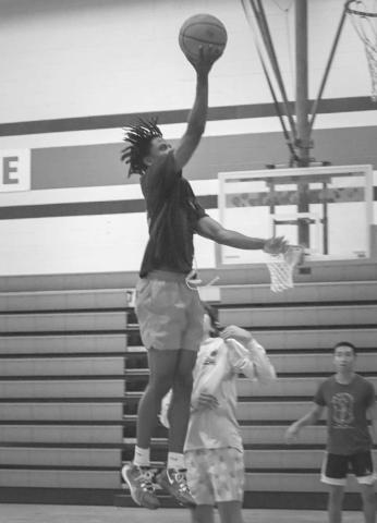 LAY - IN - Levelland athlete Zyon Golightly layed the ball up this past Monday during open gym practice at the Levelland Middle School. (Staff photo by Aalijah Soliz)